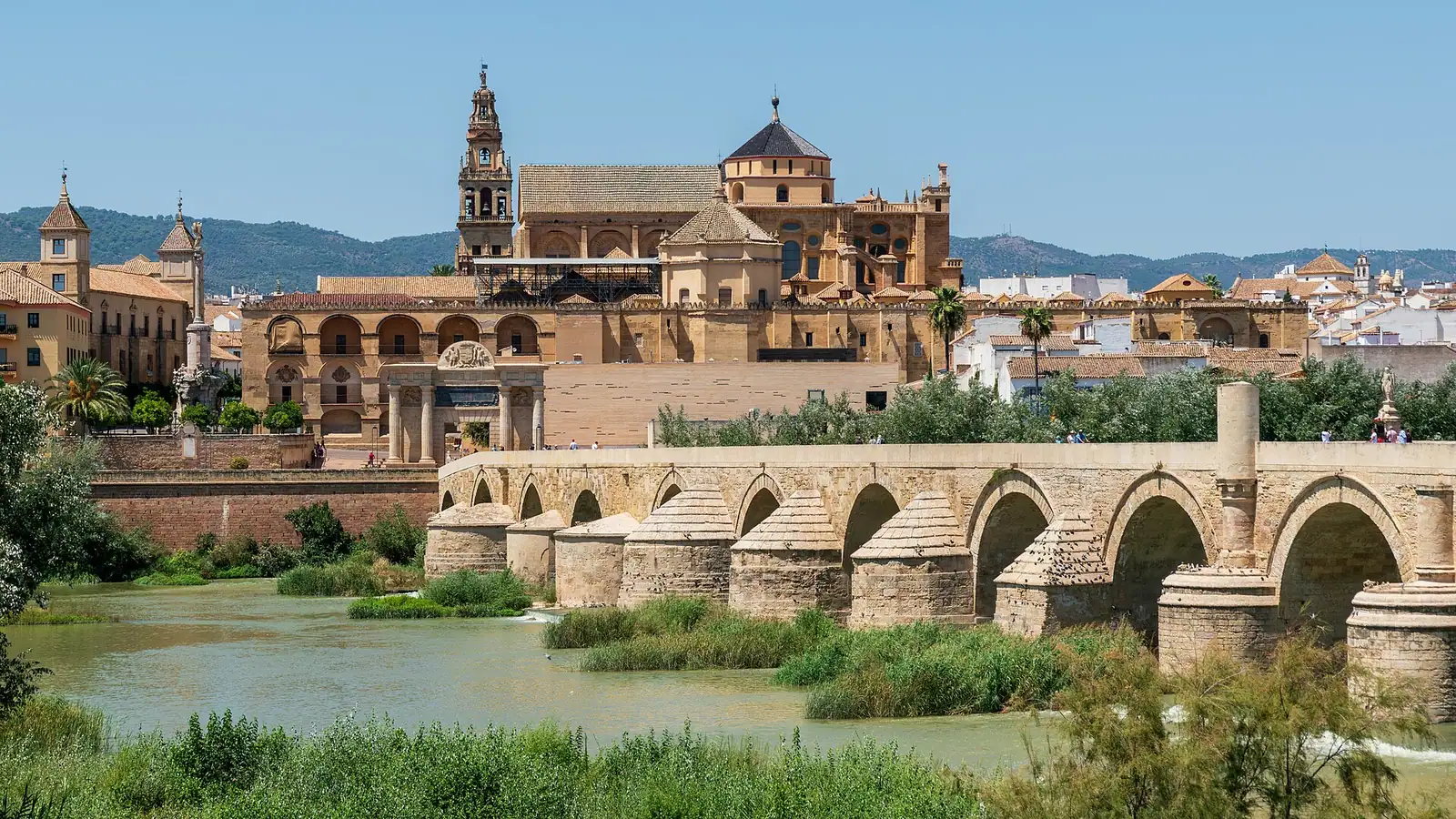 Córdoba – Views of the Historic centre of Córdoba from the Guadalquivir River, from where the Mosque-Cathedral and the Roman Bridge stand out, declared a World Heritage Site by UNESCO in 1994. In the image you can also see the…