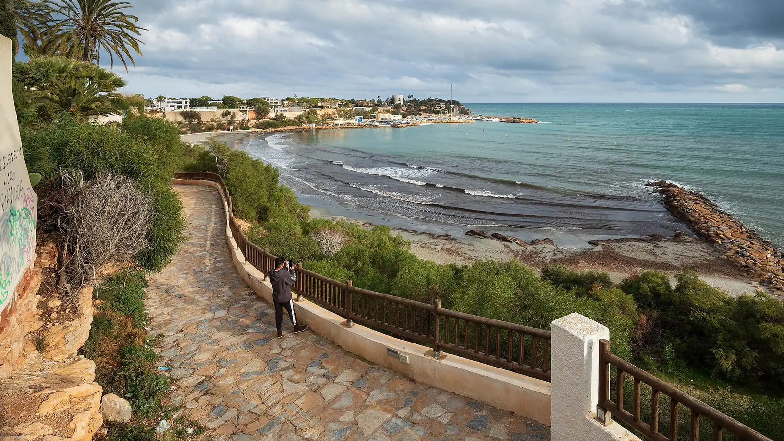 Orihuela Costa – A coastal walking path at Playa de Cabo Roig in Orihuela Costa, Orihuela, Alicante, Spain in 2022 January.